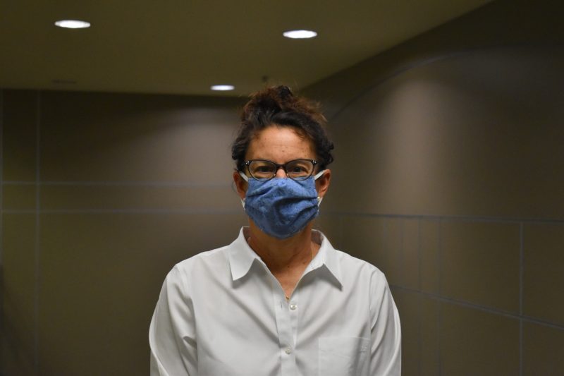 Patricia Hammer, photographed wearing a bright blue face mask recently at North End Center.
